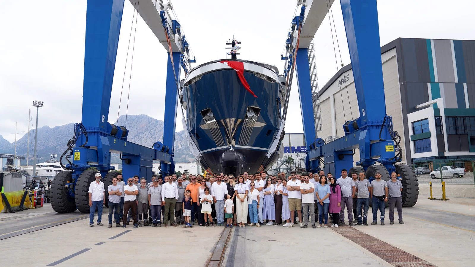 Group gathered beside KANDO 85 at the launch